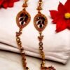 Elegant golden bracelet with black stones